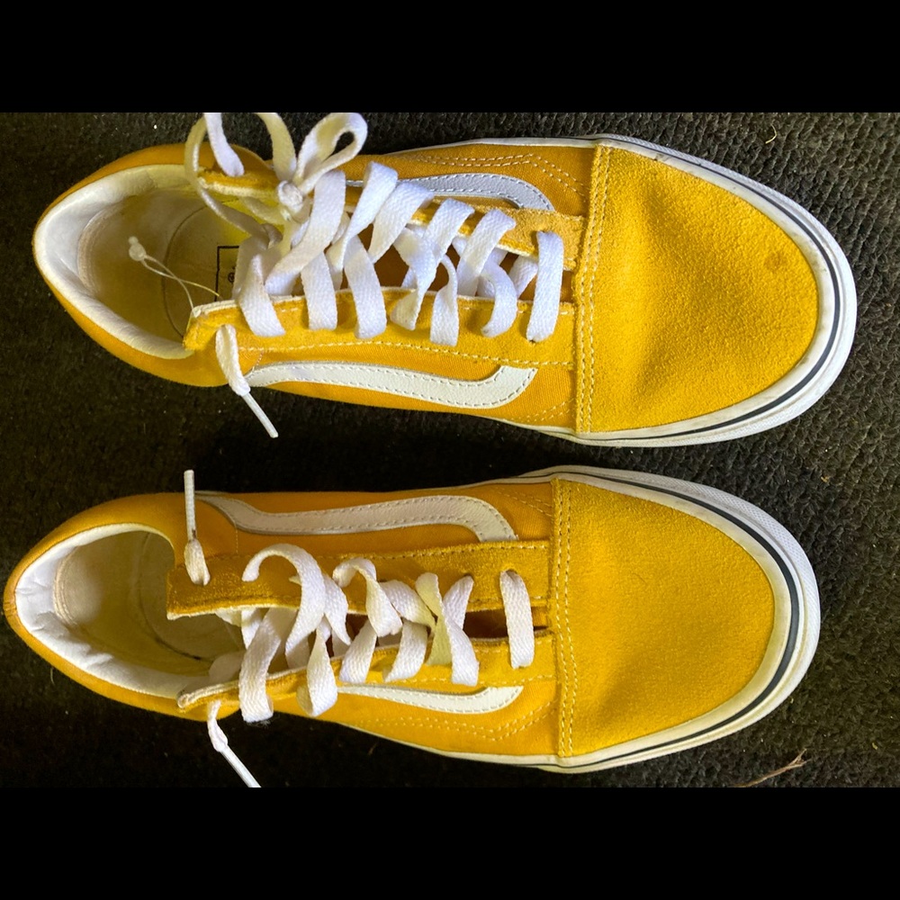 Women size 7 yellow (mustard color) low top vans , white laces